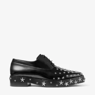 Jimmy Choo Noir Kei Ninomiya Star Buty czarne sznurowane z polerowanej skóry cielęcej z ozdobą w kształcie gwiazdy Jimmy Choo Noir Kei Ninomiya Star Buty czarne sznurowane z polerowanej skóry cielęcej z ozdobą w kształcie gwiazdy