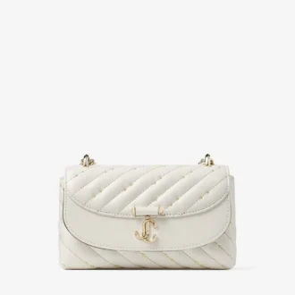 Mała pikowana torebka crossbody Curve z nappa w kolorze latte