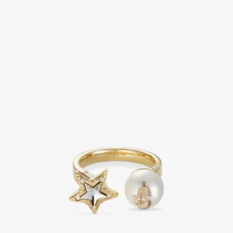Pierścionek Jc Star Pearl Pierścionek z metalu w złotym wykończeniu z kryształową gwiazdką i perłą Pierścionek Jc Star Pearl Pierścionek z metalu w złotym wykończeniu z kryształową gwiazdką i perłą